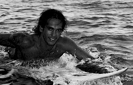 Surf And Turf In Tahiti by Michel Haddi